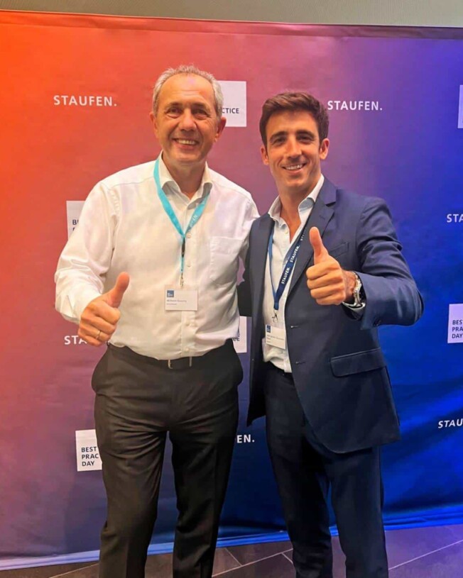 Wilhelm Goshy and Ignacio Quinonero Ferrer standing together smiling