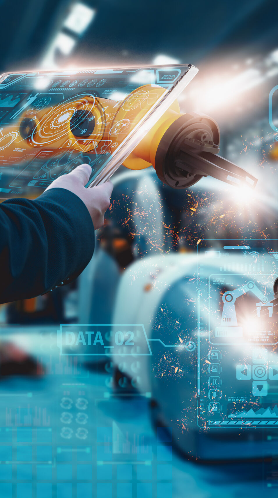 Engineer control automated robot arm Assembly in factory,via smart tablet,automotive industrial,vehicle production line,manufacturing,operation business and industry 4.0,Artificial intelligence or AI
